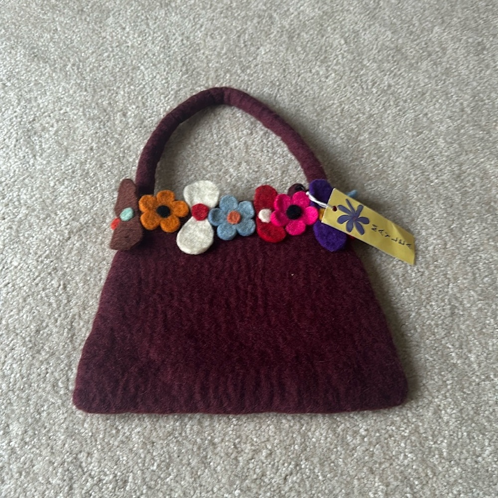 Beautiful bag by Maylea tag attached wine color with felt floral trim